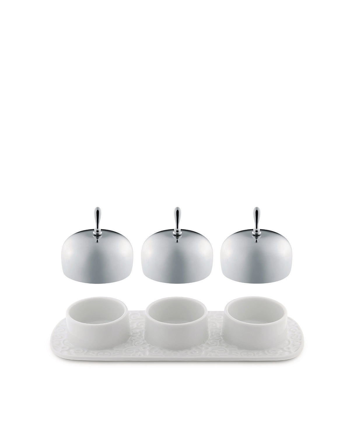 White porcelain condiment serving set by Alessi with a patterned tray and three domed chrome lids.