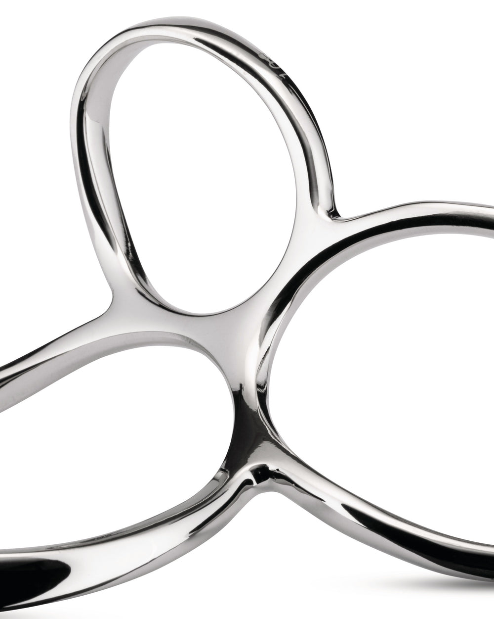 Polished silver metal serving tongs by Alessi with an abstract, fluid, and reflective design.