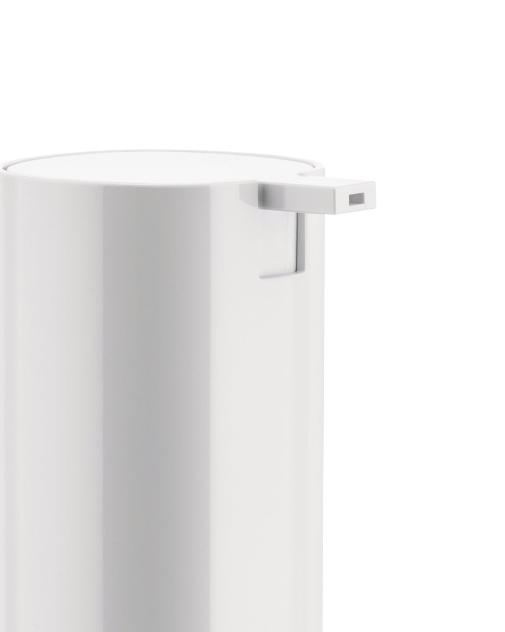 White pump dispenser by Alessi with a sleek, minimalist design and rectangular nozzle, cropped view.