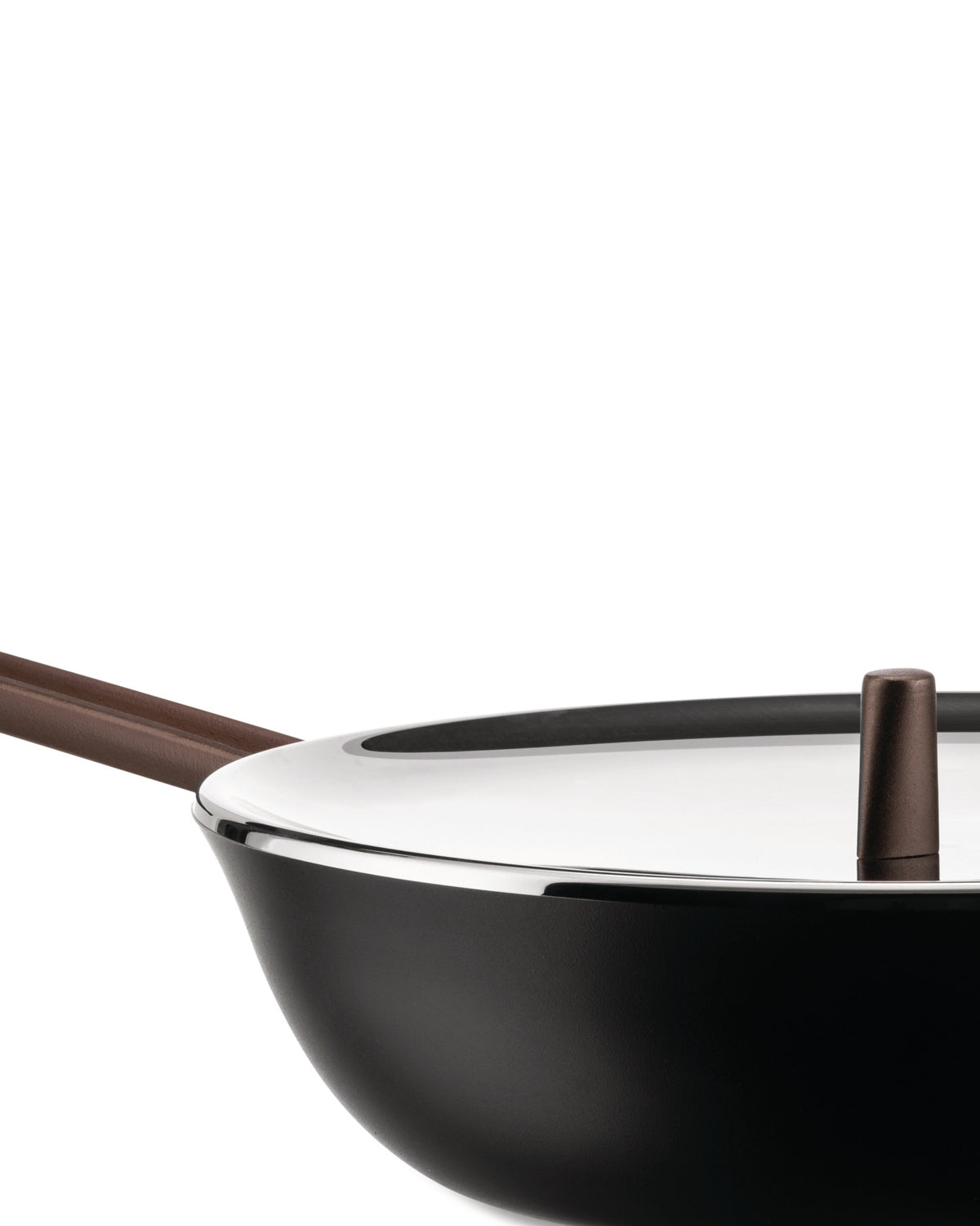 Matte black wok pan by Alessi with a brown handle, shiny silver rim, and a reflective white lid with a brown knob, close-up.