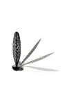 Black oscillating fan by Alessi with a tall, oval fin featuring intricate perforated designs, shown in motion.