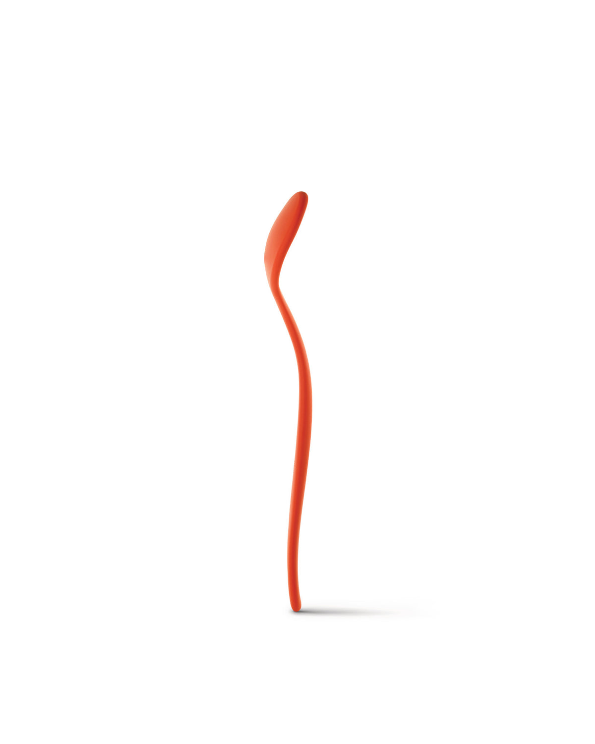 Orange serving spoon by Alessi, with a tall, curved handle and heart-shaped scoop, standing upright.