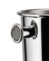 Polished stainless steel wine cooler by Alessi, close-up of a side handle and rim on white.