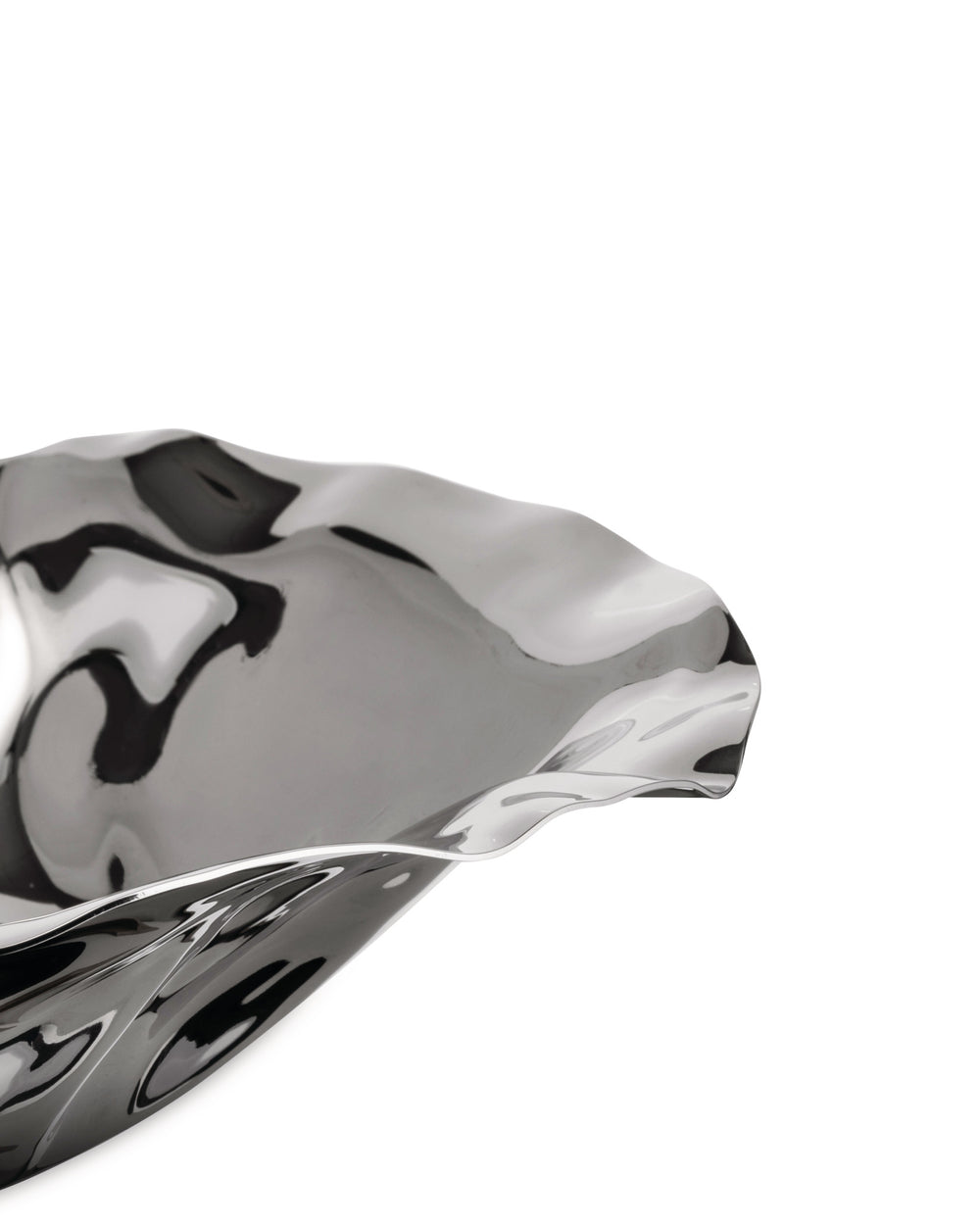 Wavy metallic silver bowl by Alessi with a highly reflective surface and organic, fluid shape, cropped view.