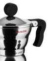 Silver stainless steel moka pot by Alessi with a black handle and knob, red A di ALESSI logo, stylized human figure, and MOKA ALESSI text.