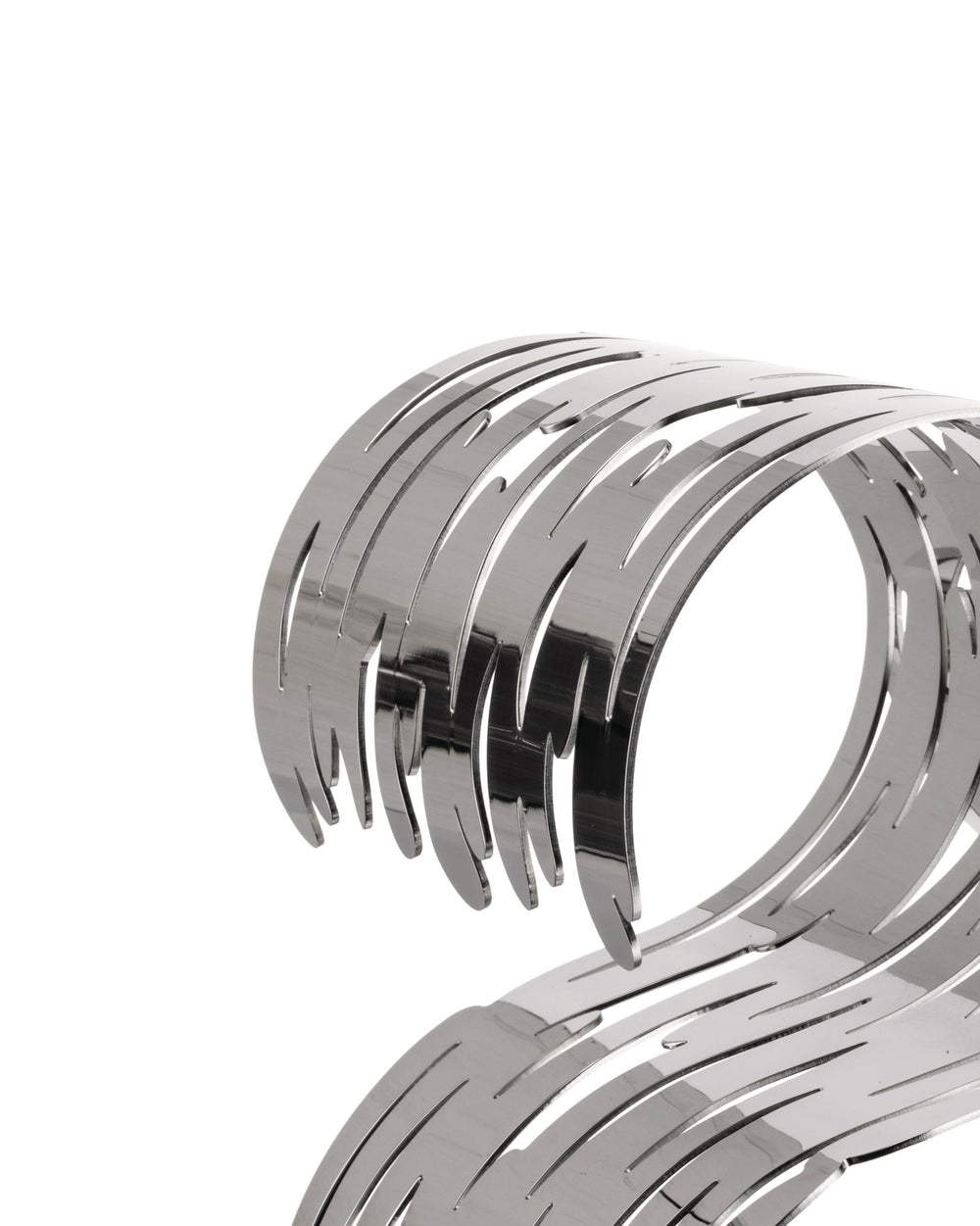 Silver metallic Barkcellar by Alessi with an intricate bark-like cut-out pattern, cropped close-up.
