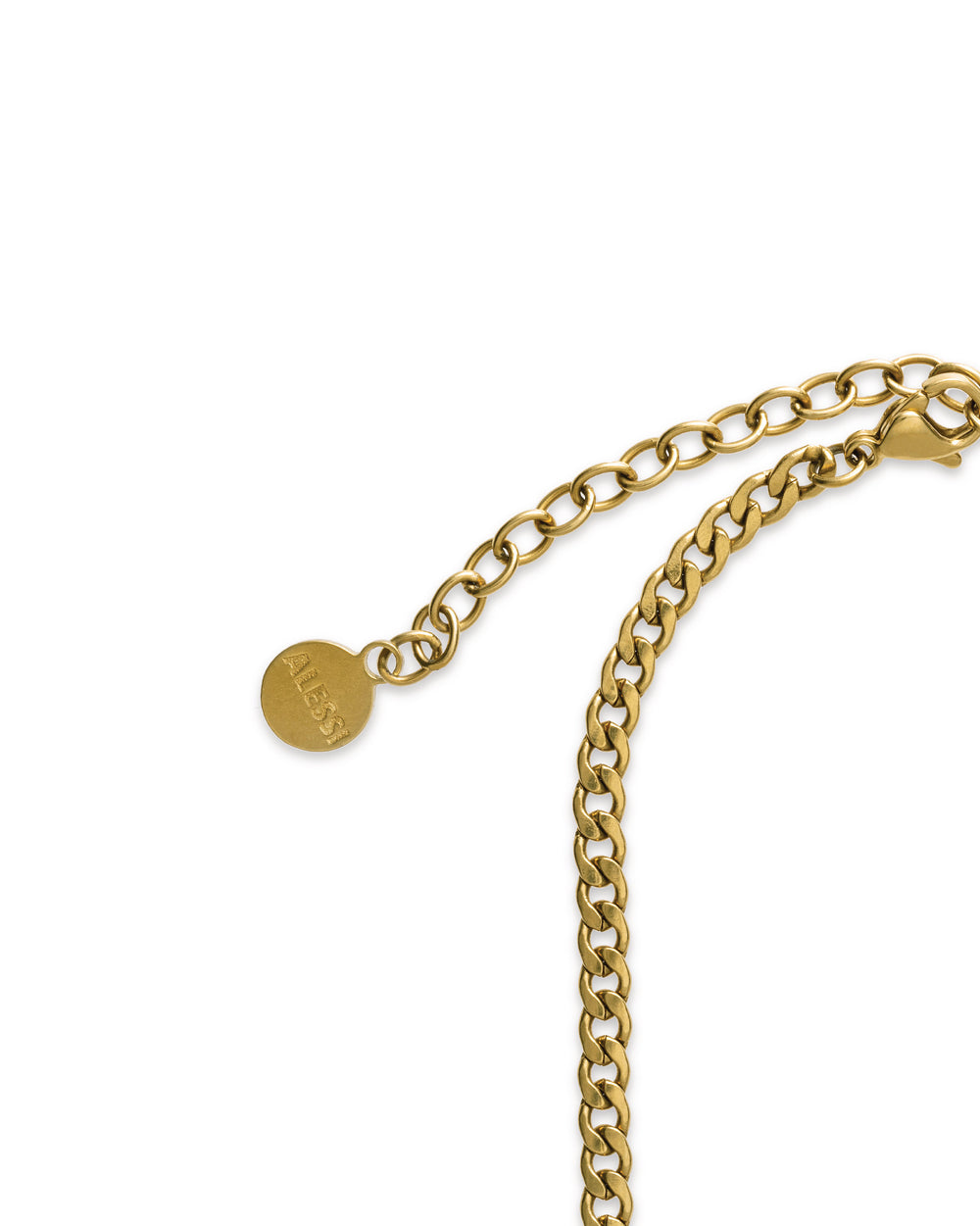 Gold-colored chain necklace by Alessi, featuring a curb chain, adjustable extender, lobster clasp, and engraved round brand tag.