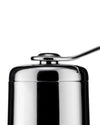 Chrome coffee grinder by Alessi with a sleek, metallic handle on top, cropped view.