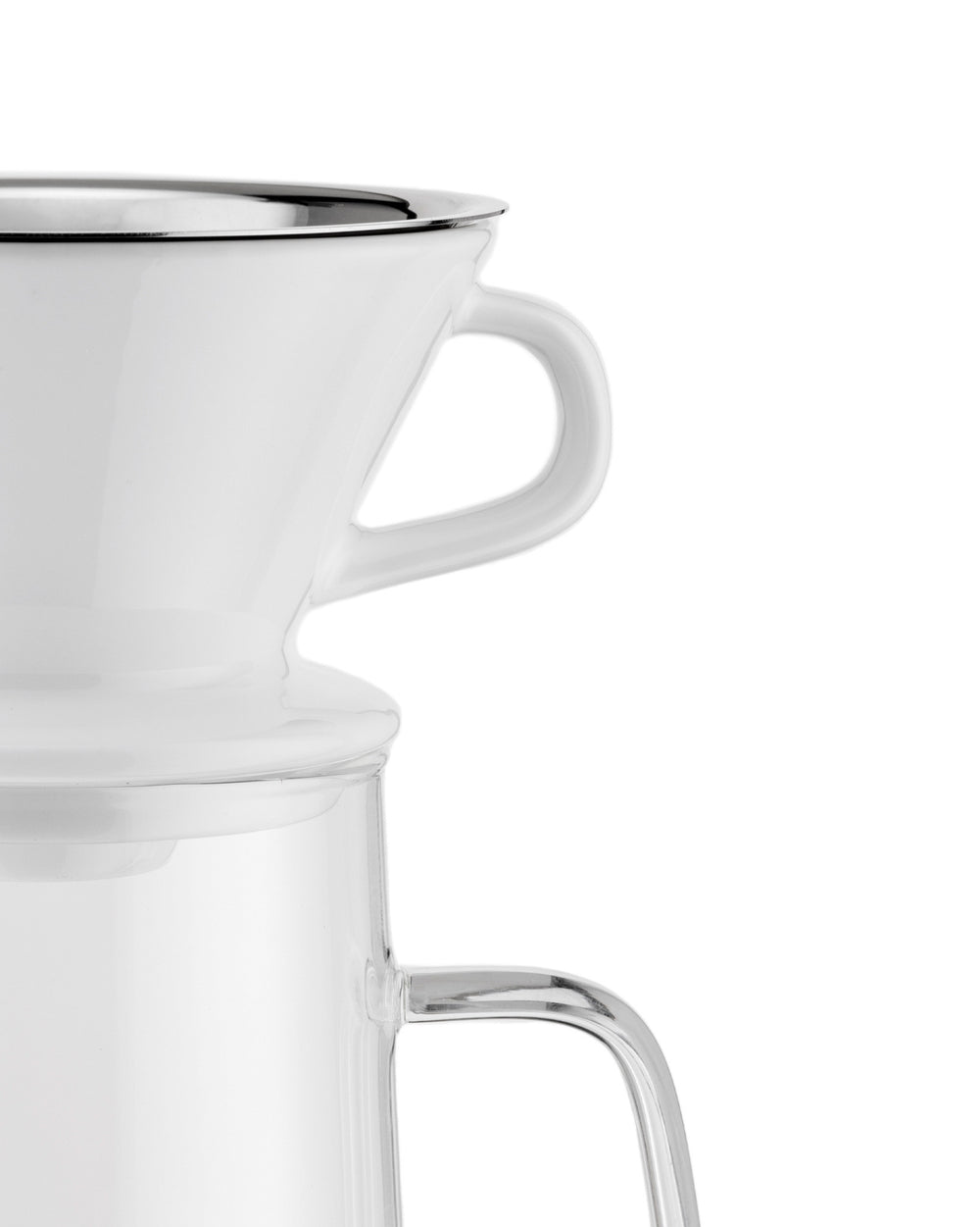 White ceramic and clear glass slow coffee maker by Alessi, with a stainless steel rim and handles, cropped.