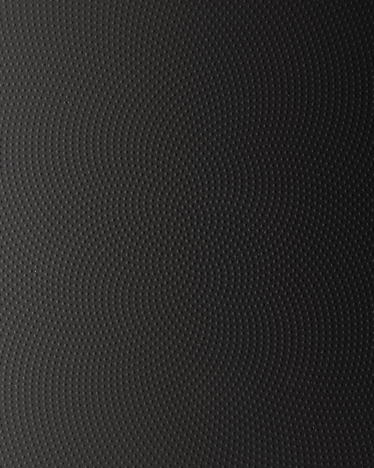 Dark gray moiré patterned surface by Alessi, featuring a wavy raised dot texture.