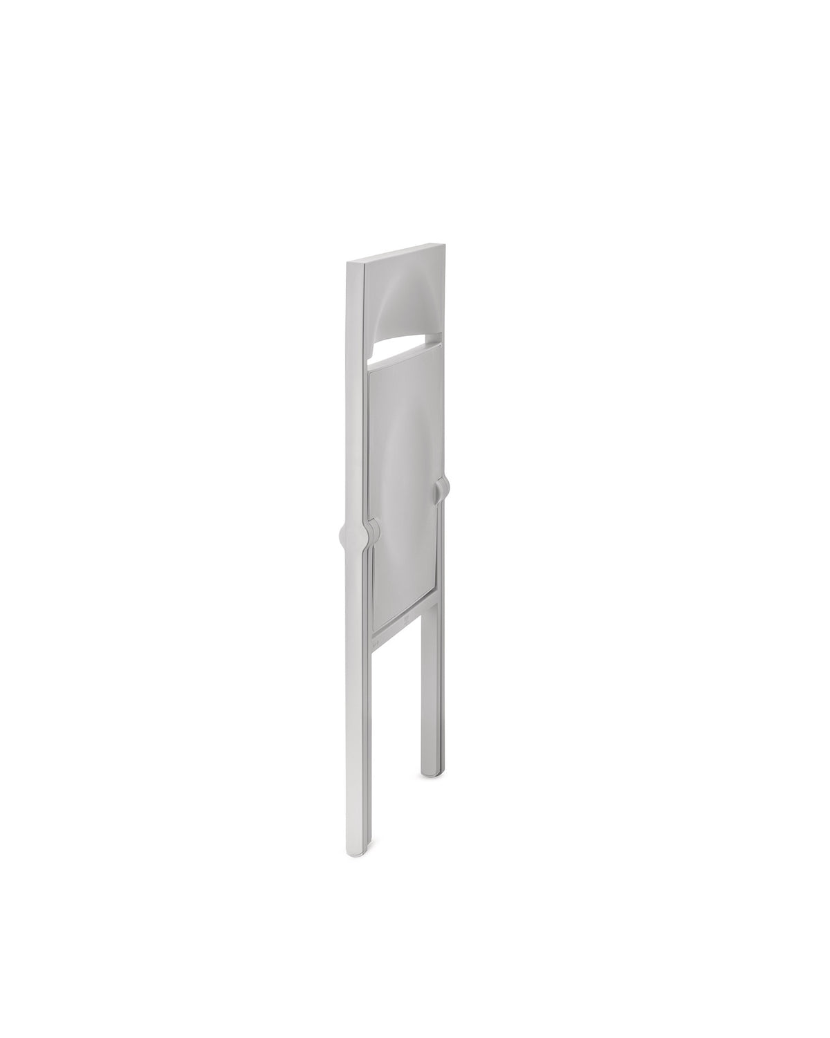 Silver folding chair by Alessi, sleek and modern, standing upright at an angle.
