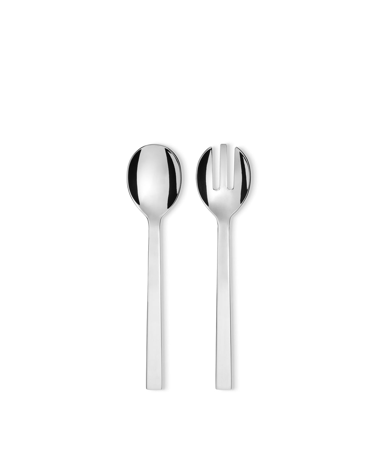 Polished silver salad servers by Alessi, a spoon and two-tine fork, standing upright.