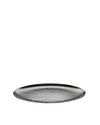Oval silver metallic serving platter by Alessi with a flowing wood grain pattern.