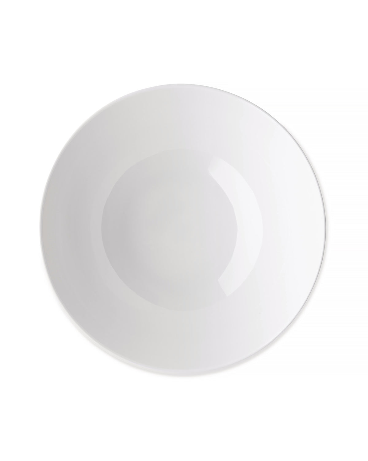 White ceramic bowl by Alessi, glossy and circular, viewed from above.