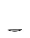 Black, sleek, curved serving dish by Alessi, centered on a white background.