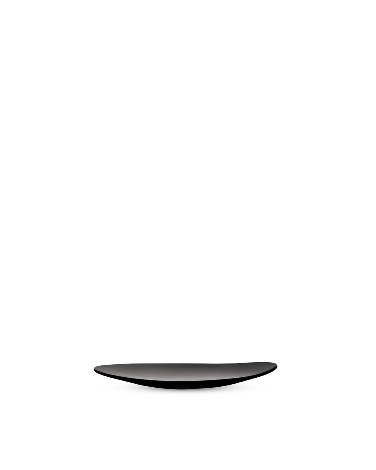 Black, sleek, curved serving dish by Alessi, centered on a white background.