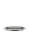 Silver oval metal tray by Alessi with a highly reflective surface, viewed from a slight angle.