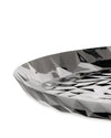 Silver reflective faceted tray by Alessi, featuring a modern geometric design, cropped view.