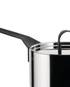 Stainless steel saucepan by Alessi with a black ergonomic handle and a matching lid with a black knob, cropped.