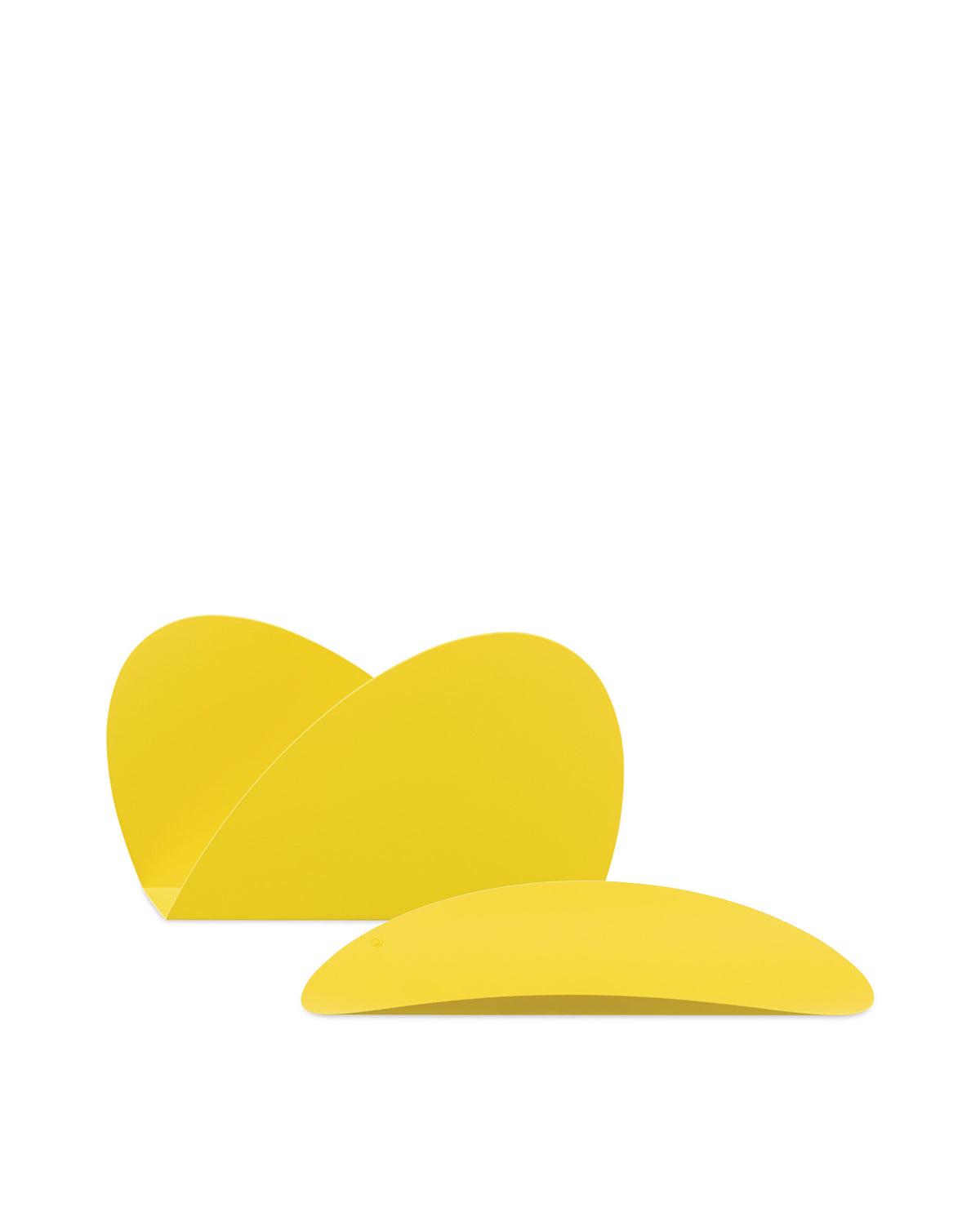 Two smooth yellow elliptical objects by Alessi, one standing upright and one lying flat.