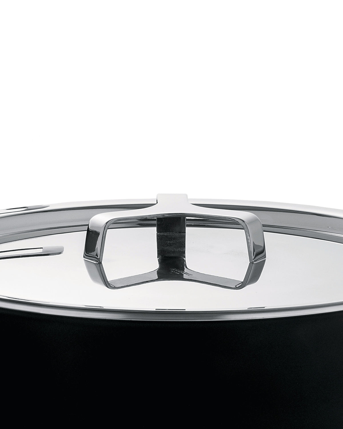 Black pot with a reflective silver lid by Alessi, featuring a modern, open square-shaped handle.