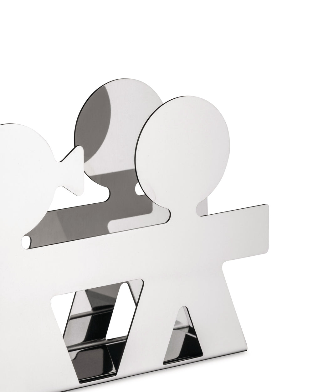Silver metal napkin holder by Alessi, featuring iconic Girotondo cutout figures and a reflective finish, in an angled view.