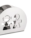 Silver polished metal napkin holder by Alessi, featuring cutout boy and girl figures, shown from a three-quarter angle.