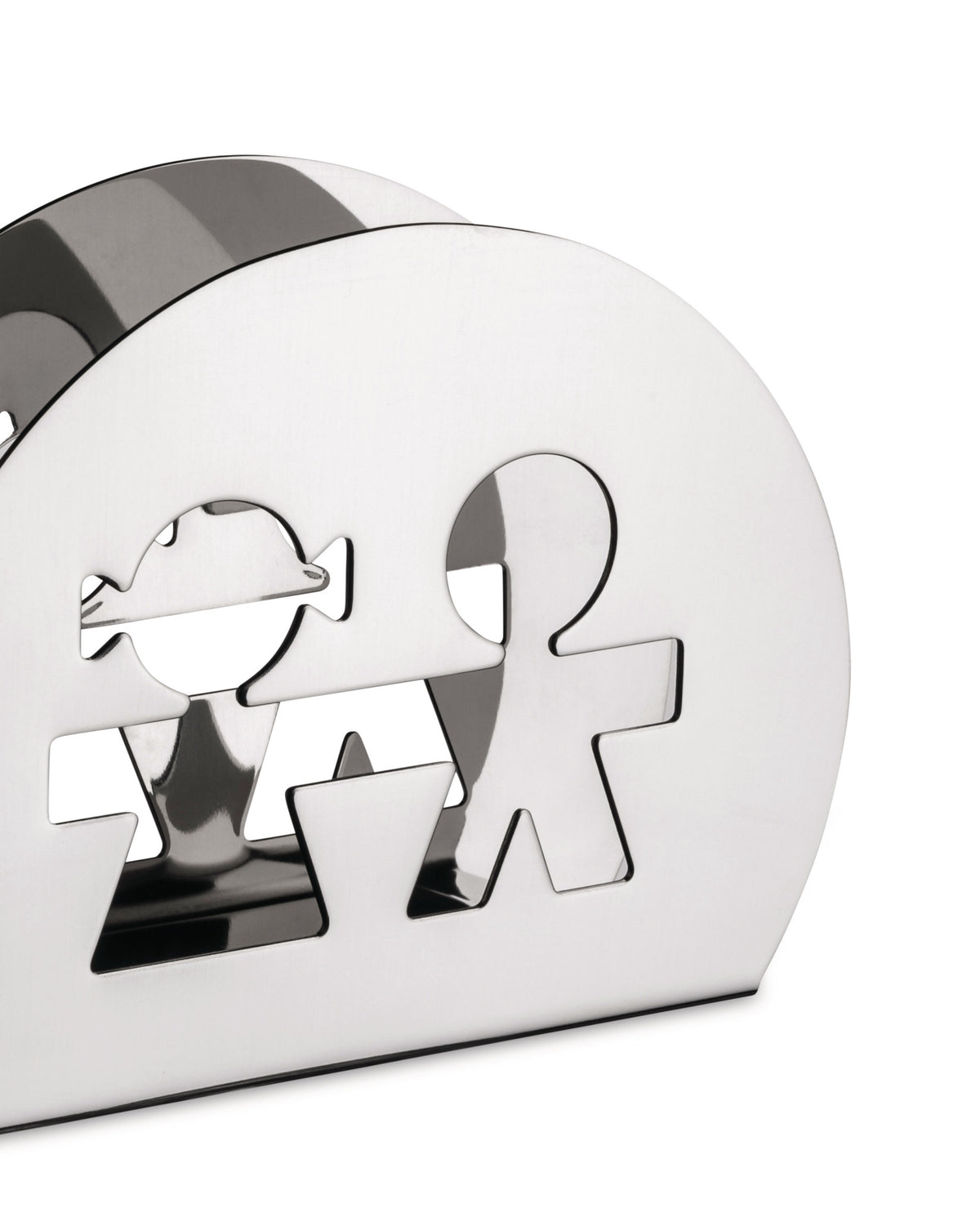Silver polished metal napkin holder by Alessi, featuring cutout boy and girl figures, shown from a three-quarter angle.