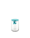 Clear glass storage jar with a turquoise lid by Alessi, featuring a small turquoise man clinging to the lid inside.
