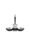 Dark grey and white cat-shaped double pet bowl by Alessi, featuring two stainless steel inner bowls and a smiling cat figure with an upright tail.