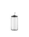 Clear glass storage jar by Alessi with a black lid topped by a white cat figurine, front view.
