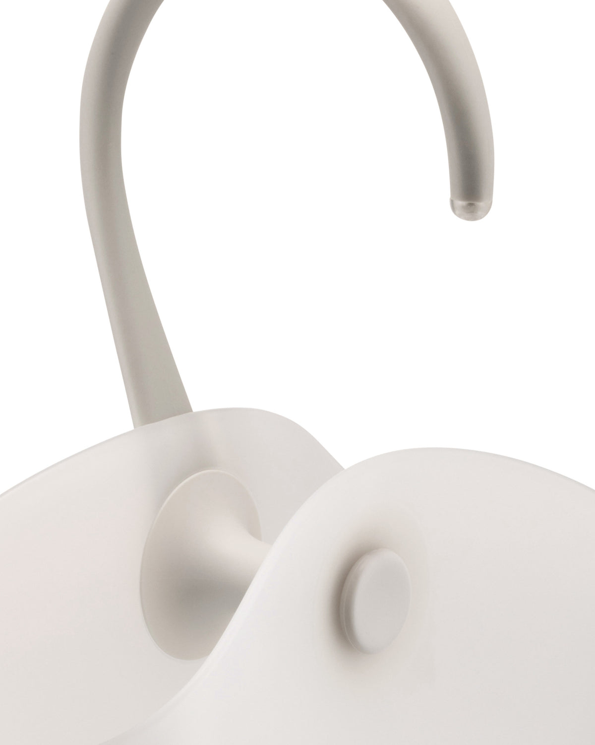 Light grey cooler by Alessi with a curved handle, clear tip, and matte texture.