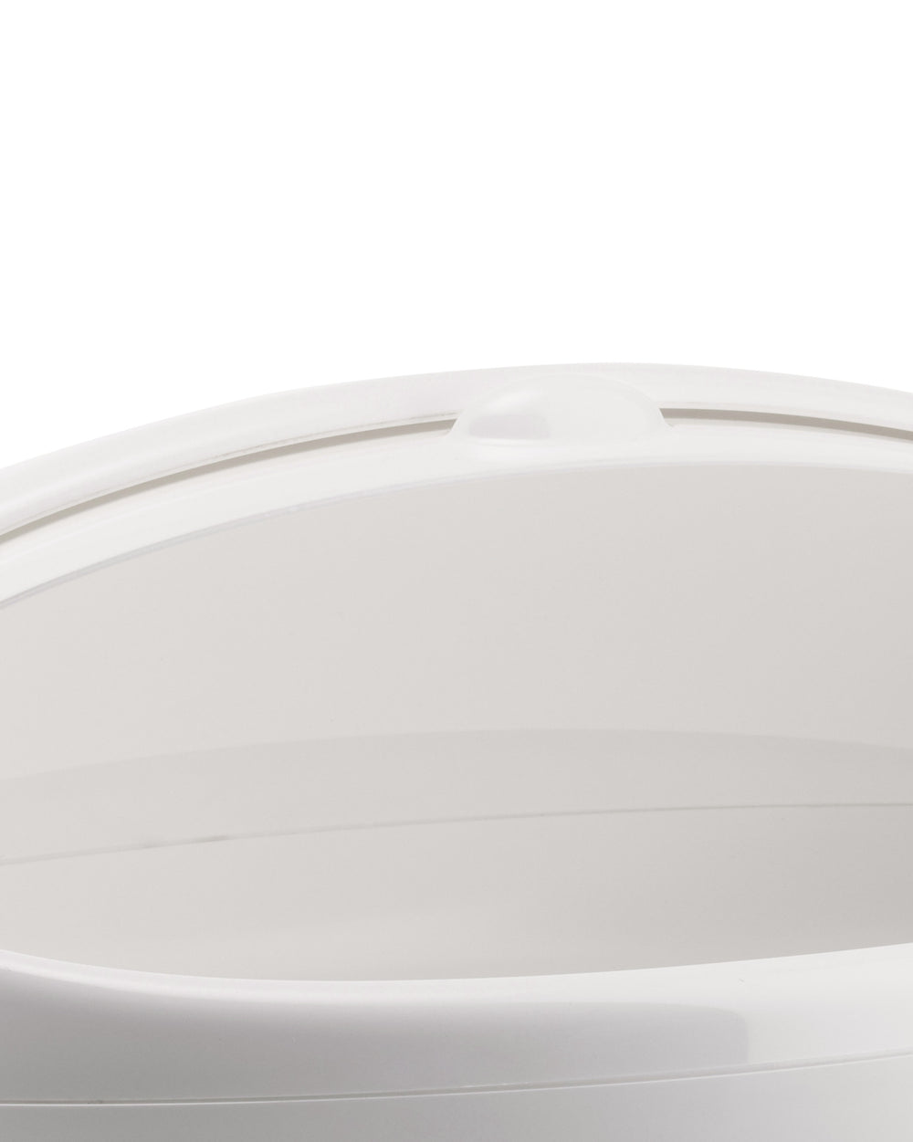 White container by Alessi with a smooth, curved top edge and subtle raised handle detail, cropped view.