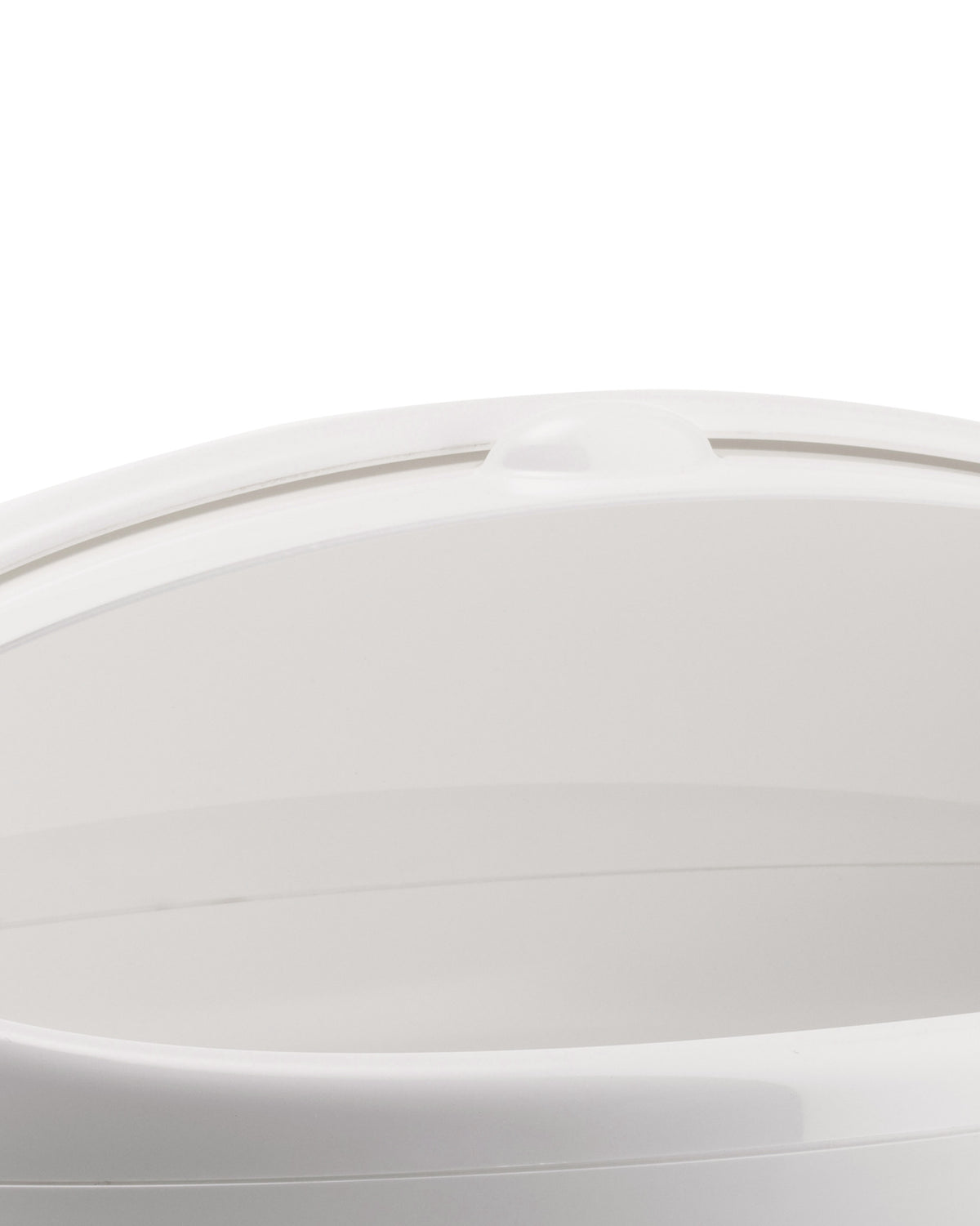 White container by Alessi with a smooth, curved top edge and subtle raised handle detail, cropped view.