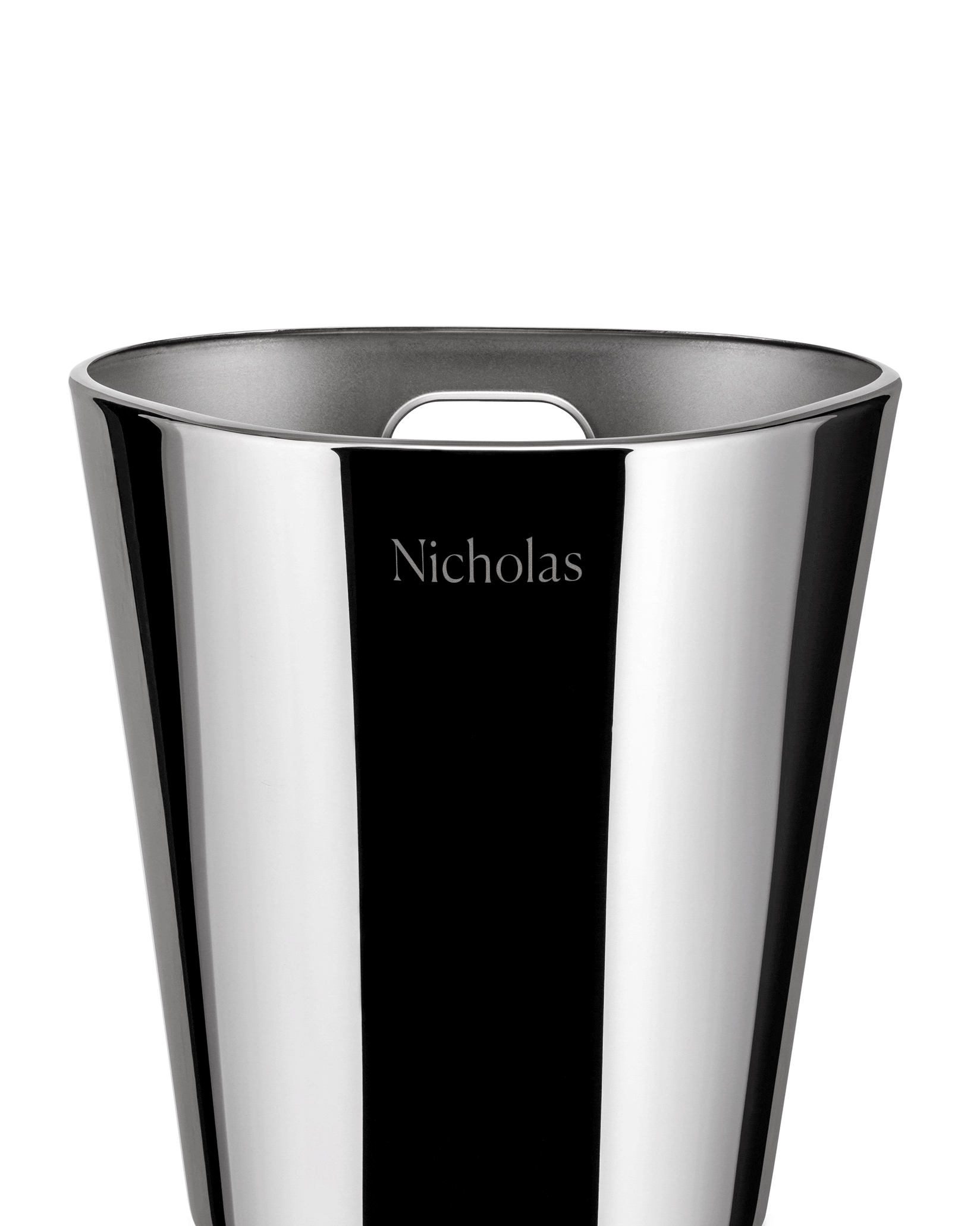Chrome wine cooler by Alessi with a tapered design, cutout handle, and 'Nicholas' engraved.