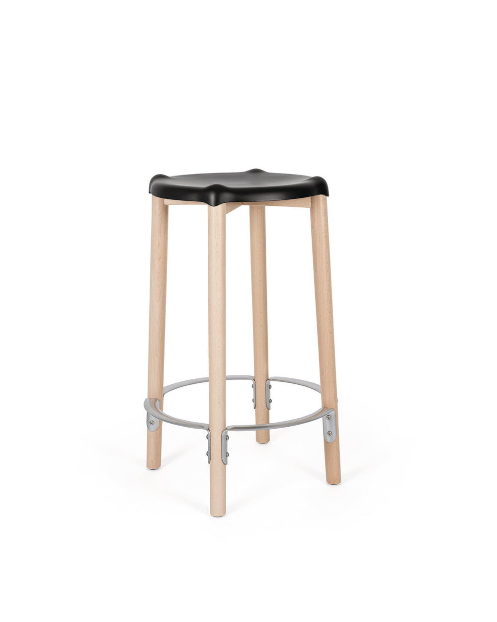 Black contoured stool by Alessi with light wood legs and a circular silver footrest, front view.