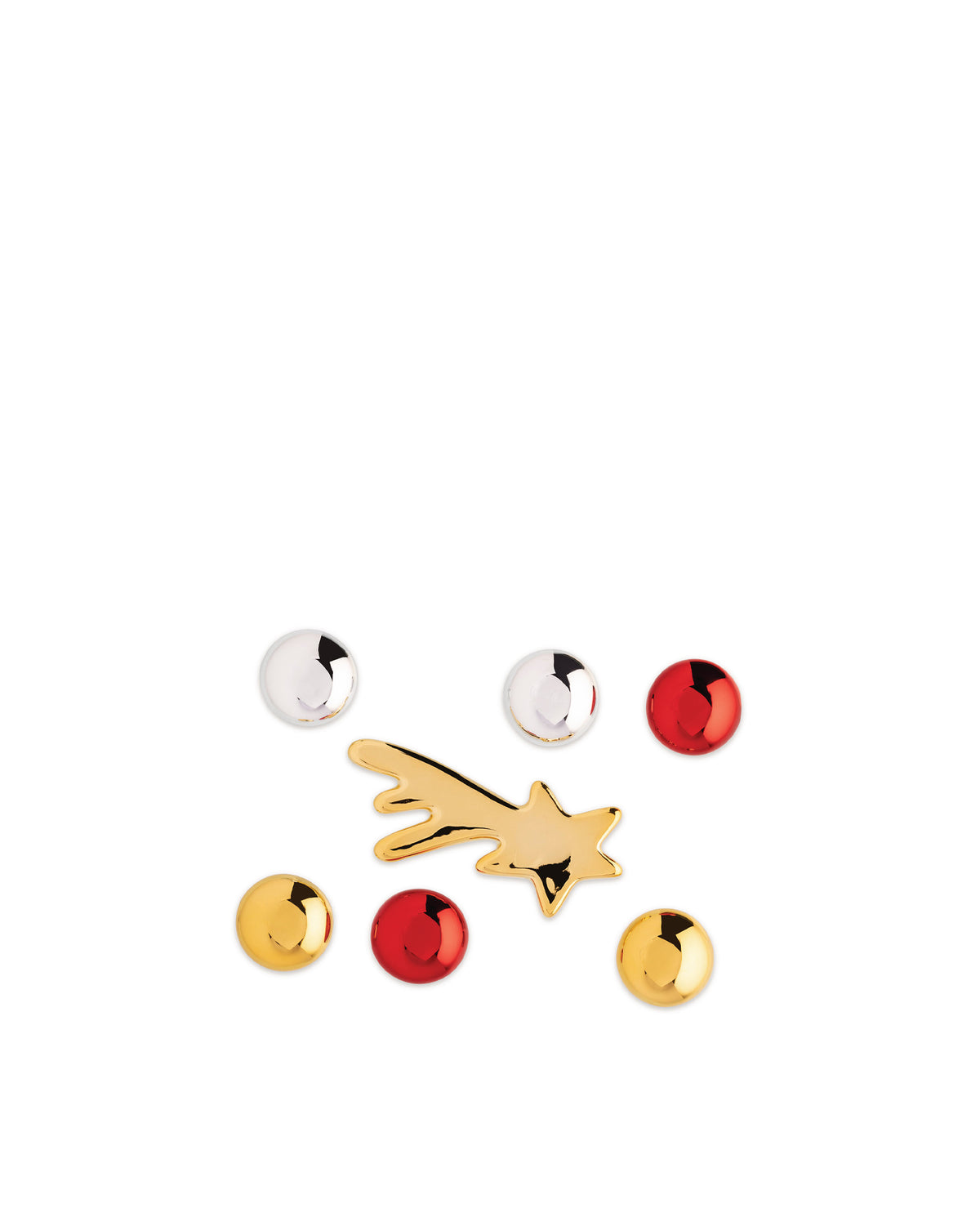 Metallic Christmas ornaments by Alessi featuring a gold shooting star and red, gold, and silver round pieces.
