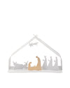 White metal nativity scene by Alessi with a striped stable design, featuring gold Holy Family figures and other white figures.
