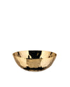 Gold metal bowl by Alessi featuring an irregularly hammered surface.