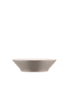 Shallow, matte taupe ceramic bowl by Alessi with flared sides, presented from a side angle.