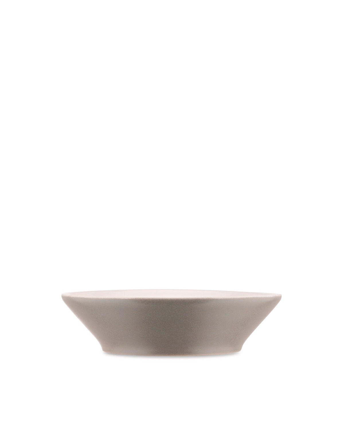 Shallow, matte taupe ceramic bowl by Alessi with flared sides, presented from a side angle.