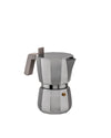Silver octagonal Moka pot by Alessi with a grey ergonomic handle and bronze safety valve.