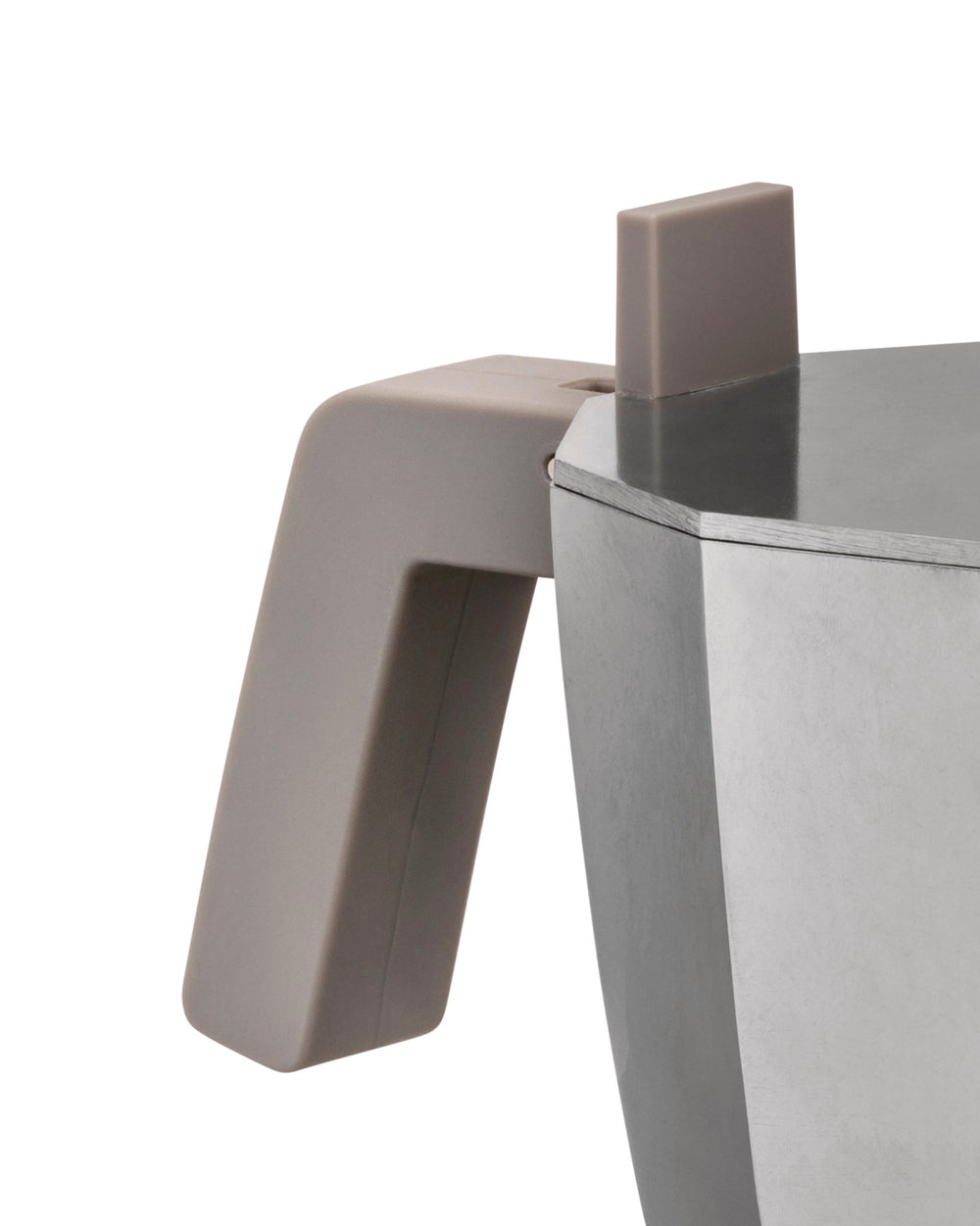 Taupe-handled metallic moka pot by Alessi with a hexagonal body, shown in a close-up side view.