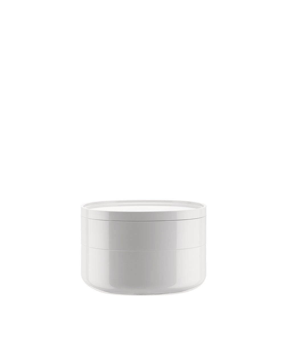 White round lidded container by Alessi, with a sleek, minimalist design.