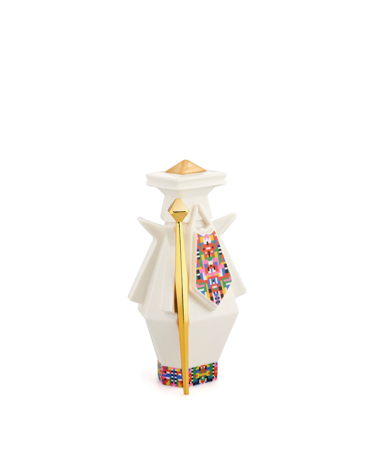 White geometric decorative figurine by Alessi with gold accents and colorful pixelated patterns.