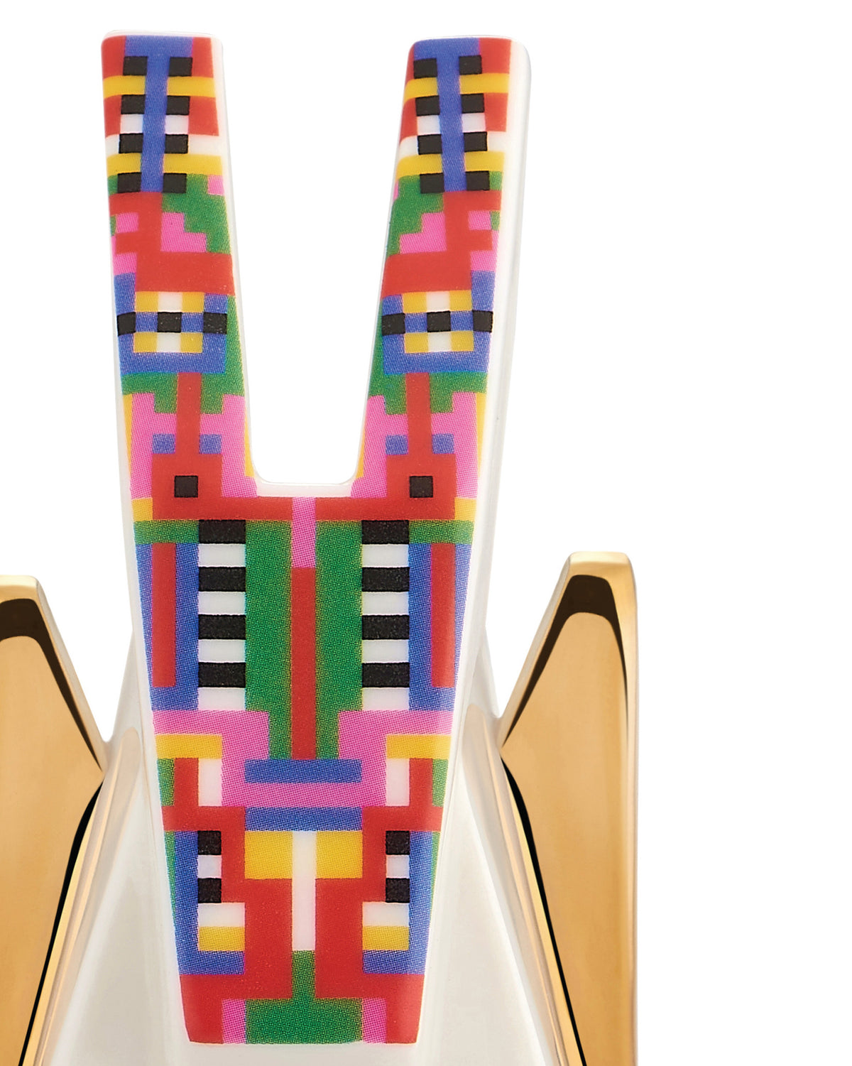 Multicolored pixelated Holyhedrics Donkey by Alessi, with a white V-shaped body and gleaming gold side panels.