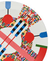A white decorative plate by Alessi, featuring a vibrant, pixelated geometric pattern of colorful squares, circles, and lines, in a cropped view.
