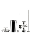 Silver stainless steel cocktail tool set by Alessi, featuring a shaker, strainer, bar spoon, jigger, and muddler on white.