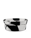 Crinkled silver metal bowl by Alessi, with a highly reflective, irregular surface.
