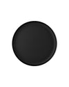 Round black textured platter by Alessi with a subtle dimpled pattern and small top edge notch.